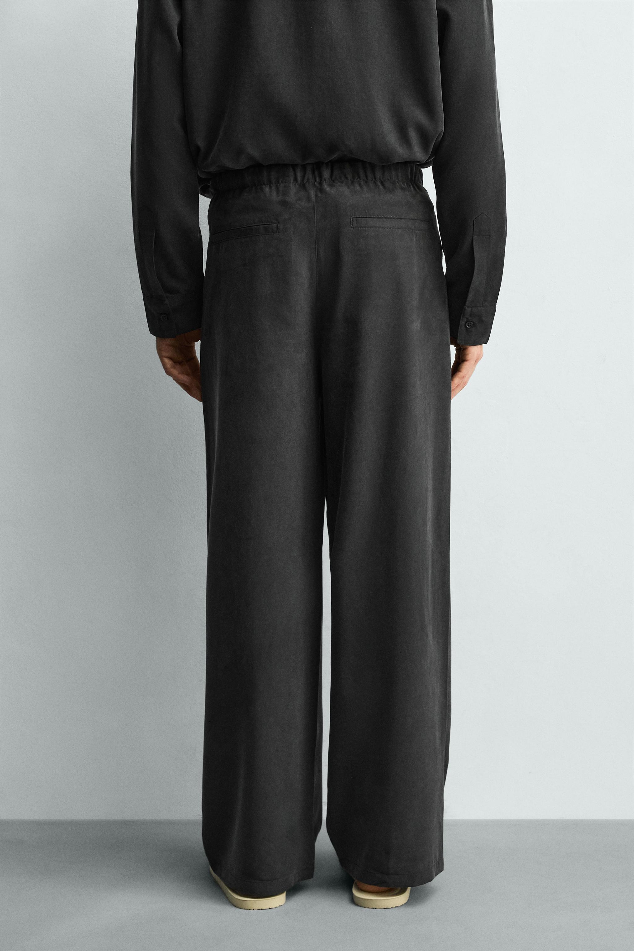 RELAXED FIT FLOWY PANTS
