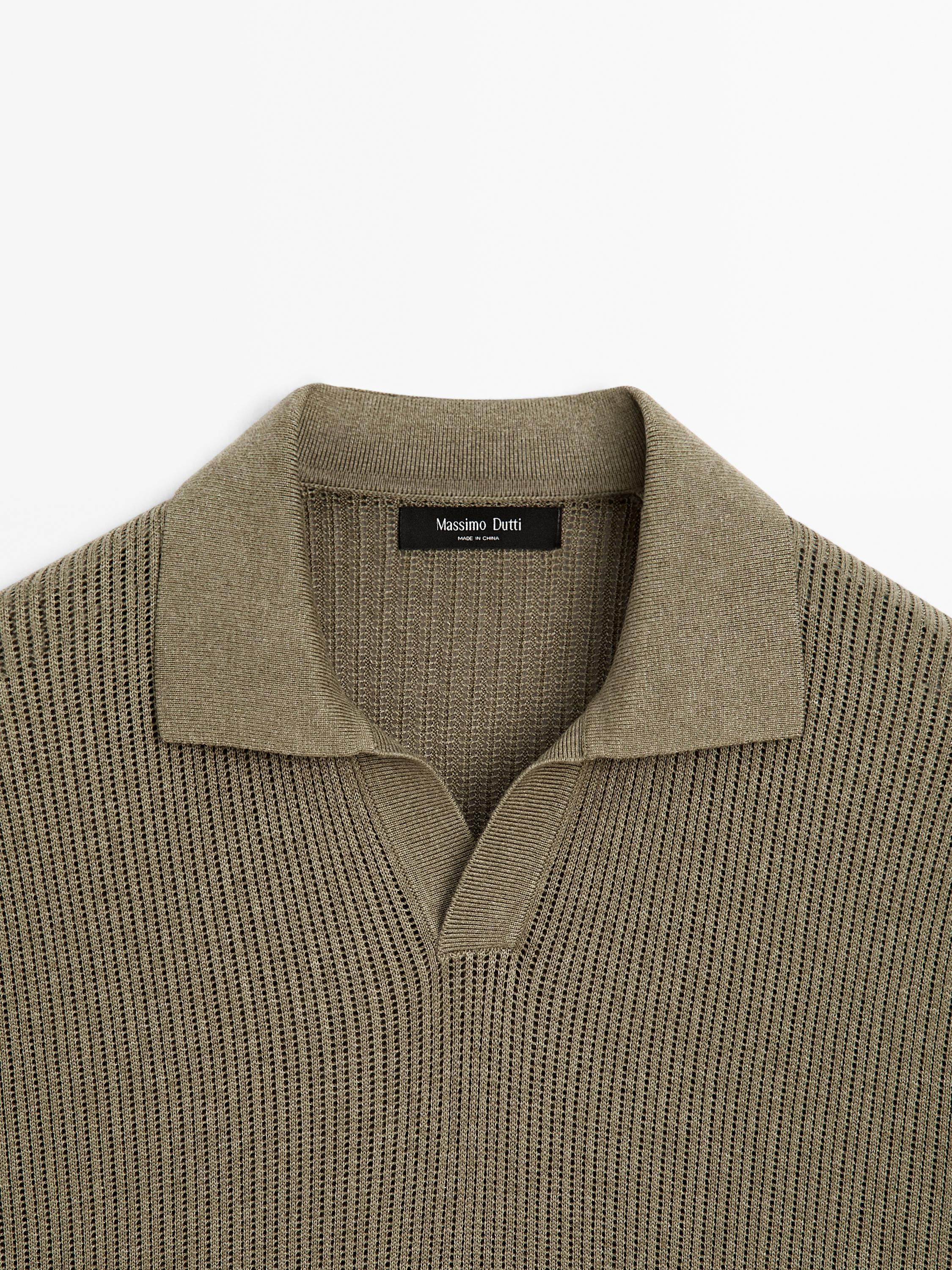 Polo en maille ajourée à col V