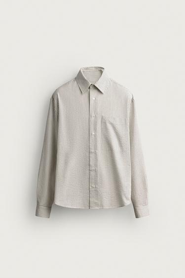 CAMISA RELAXED FIT ESTRUCTURA BOLSILLO - Crudo / Negro de Zara - Imagen 0