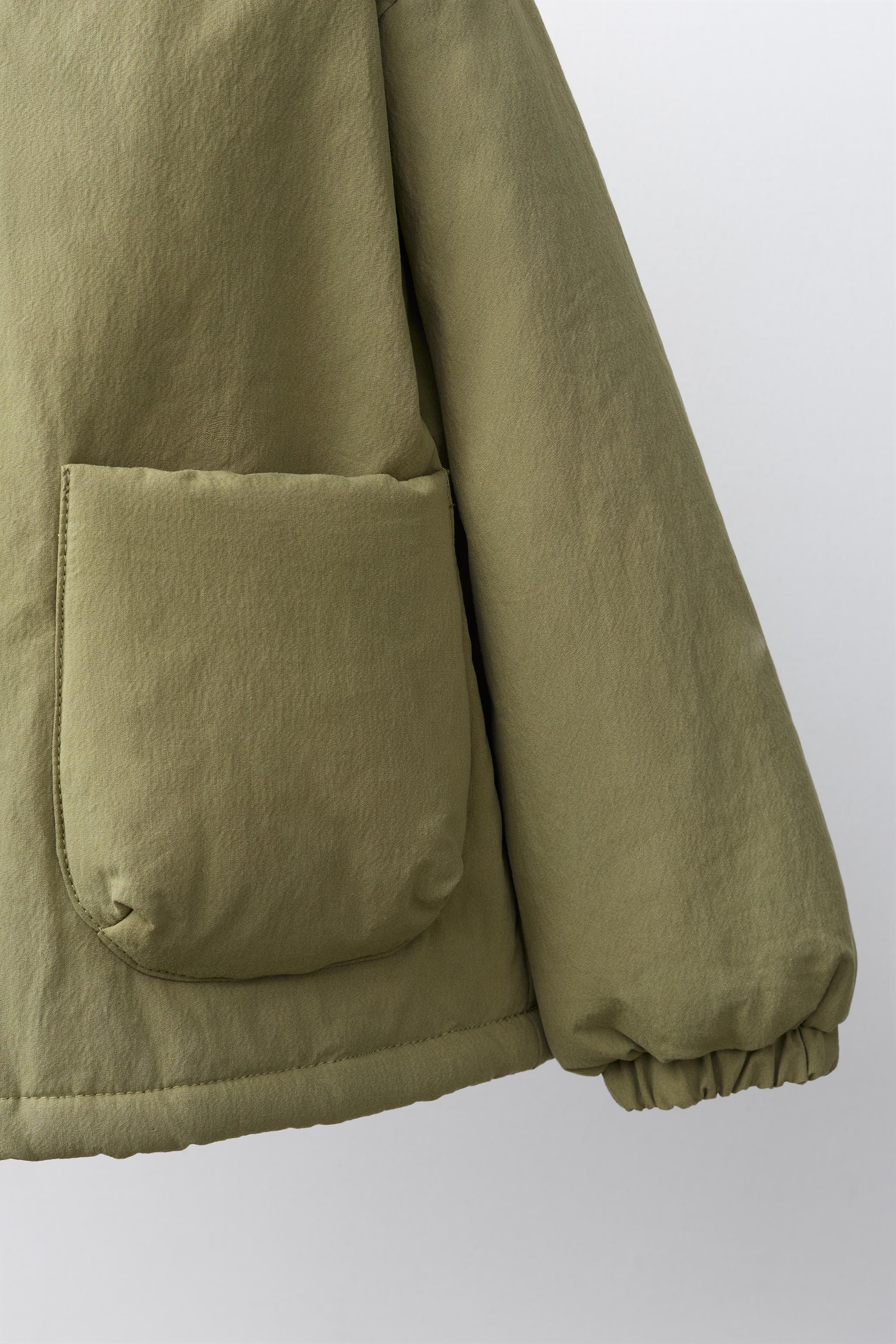 BLOUSON À CAPUCHE EFFET MOUTON