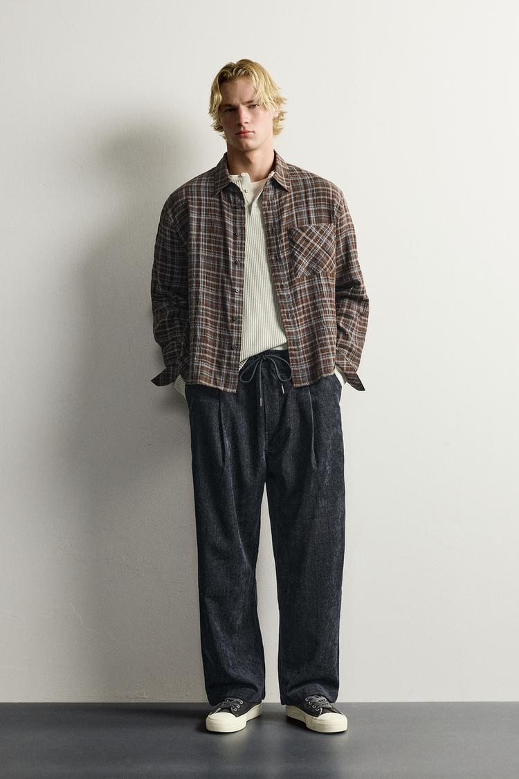SOFT IRREGULAR WASHED EFFECT TROUSERS