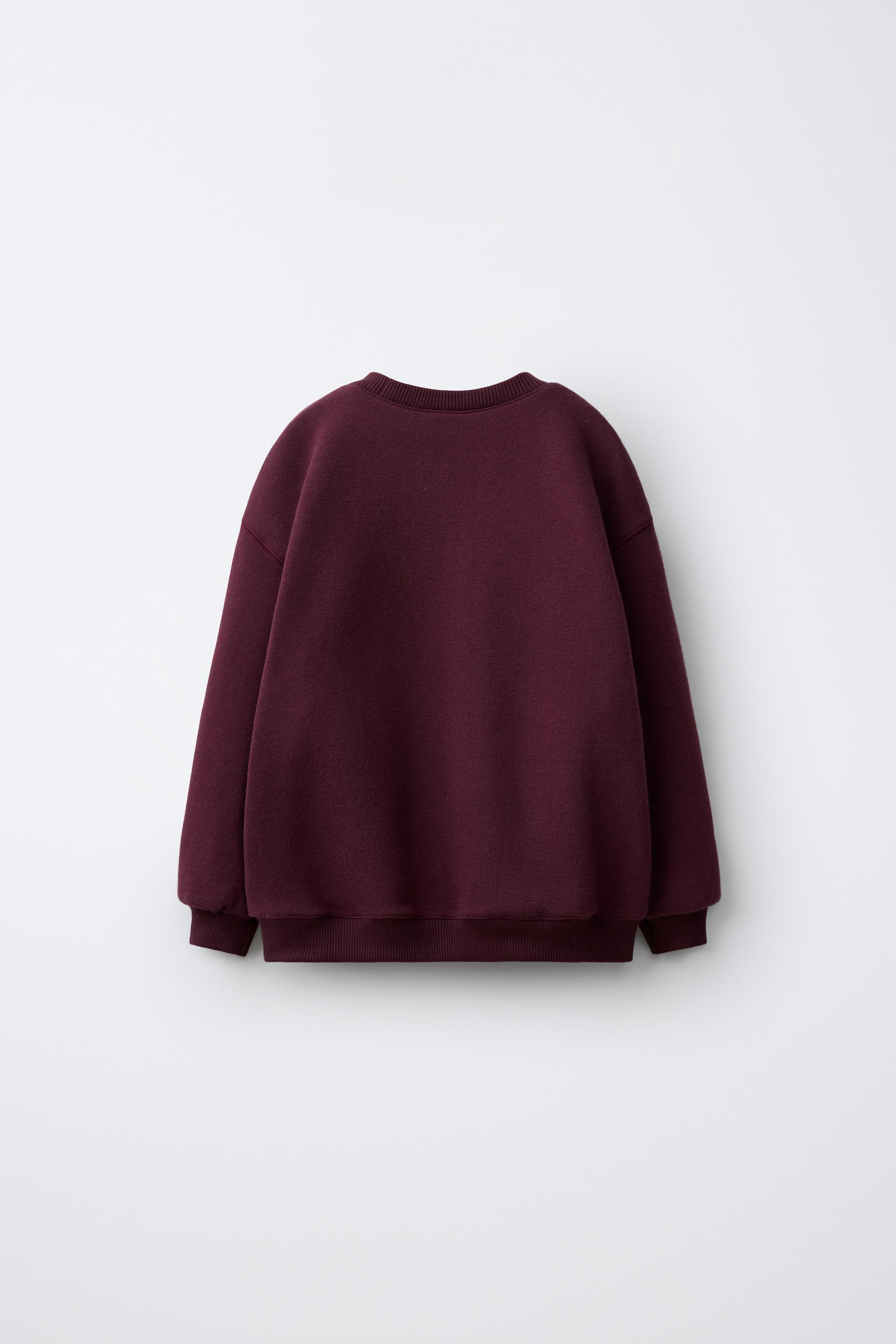 HELLO KITTY © SANRIO EMBROIDERED SWEATSHIRT