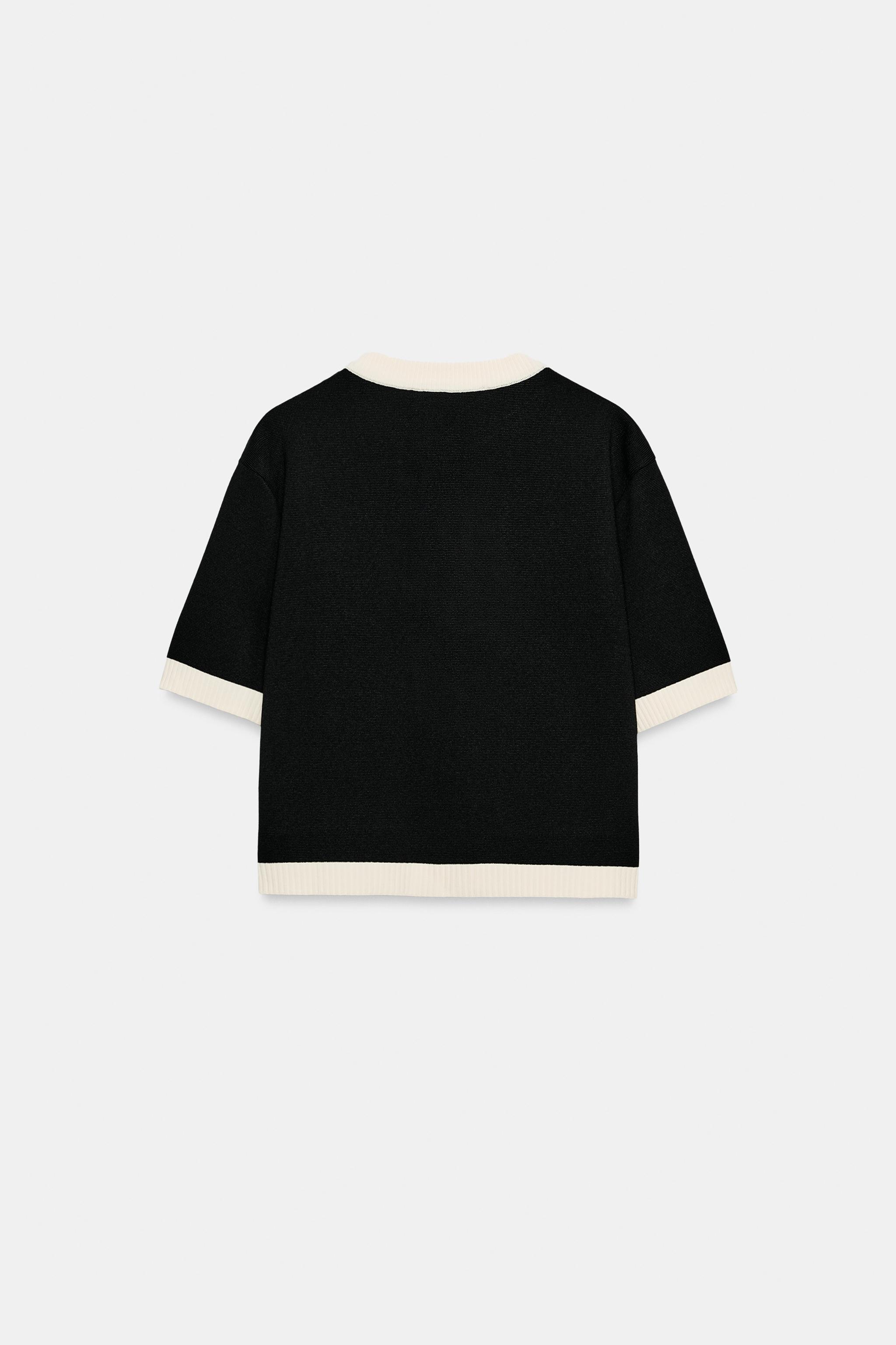 GILET EN MAILLE À MANCHES COURTES ET POCHES