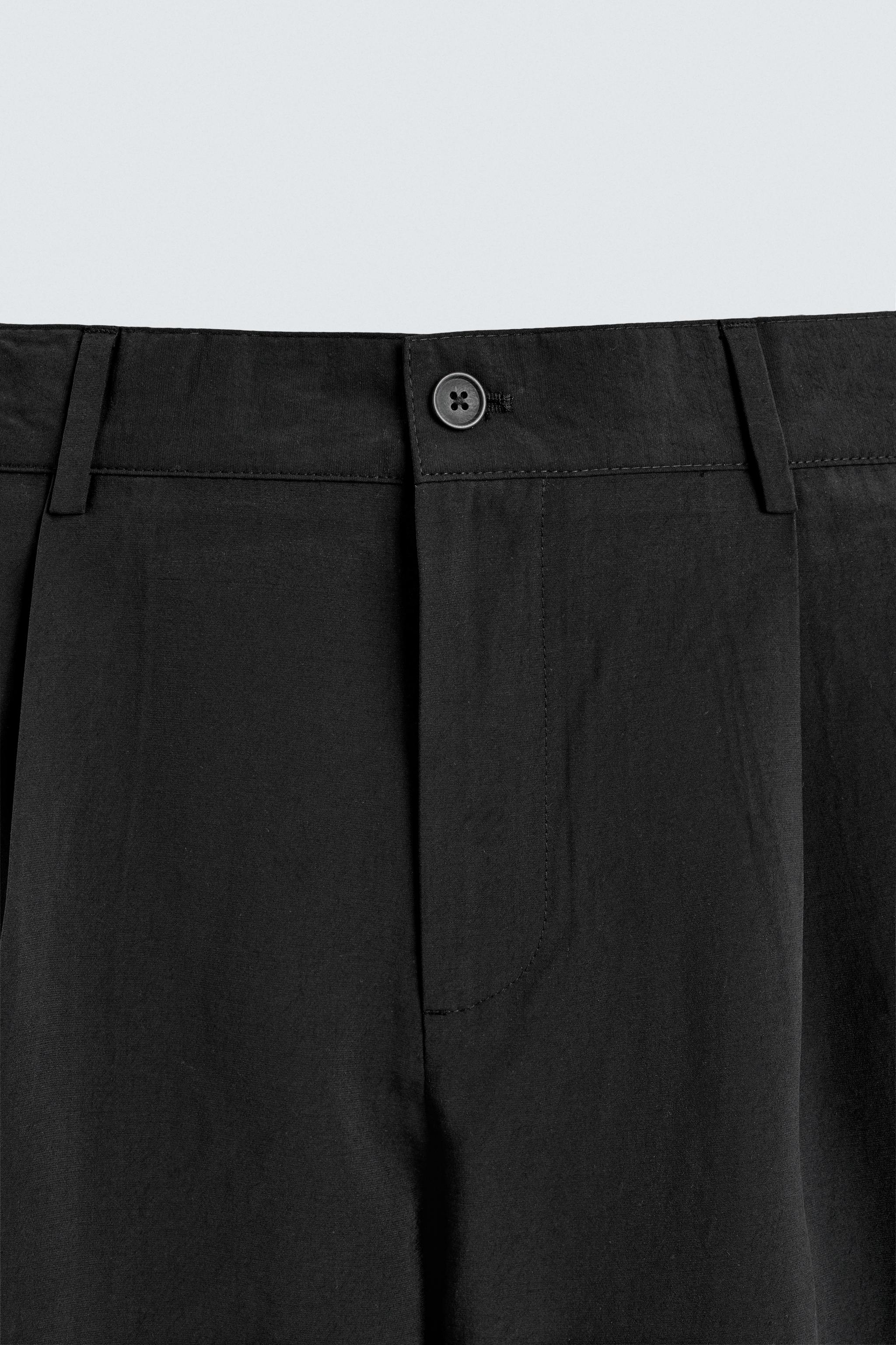 FLOWY PLEATED PANTS