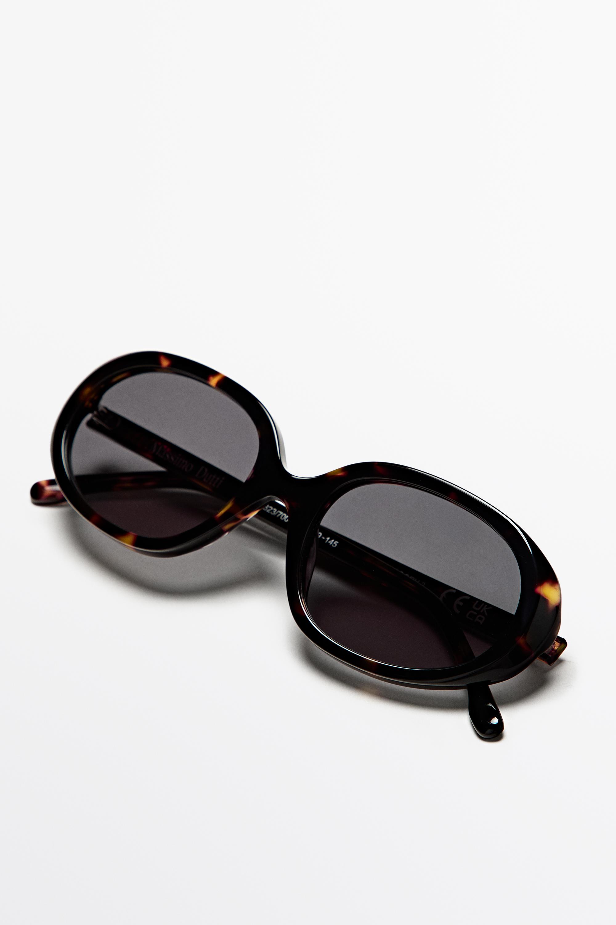 Oval tortoiseshell-effect sunglasses