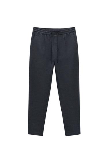 ΠΑΝΤΕΛΟΝΙ ΜΕ ΜΕΣΗ JOGGER ΜΕ ΠΙΕΤΕΣ
