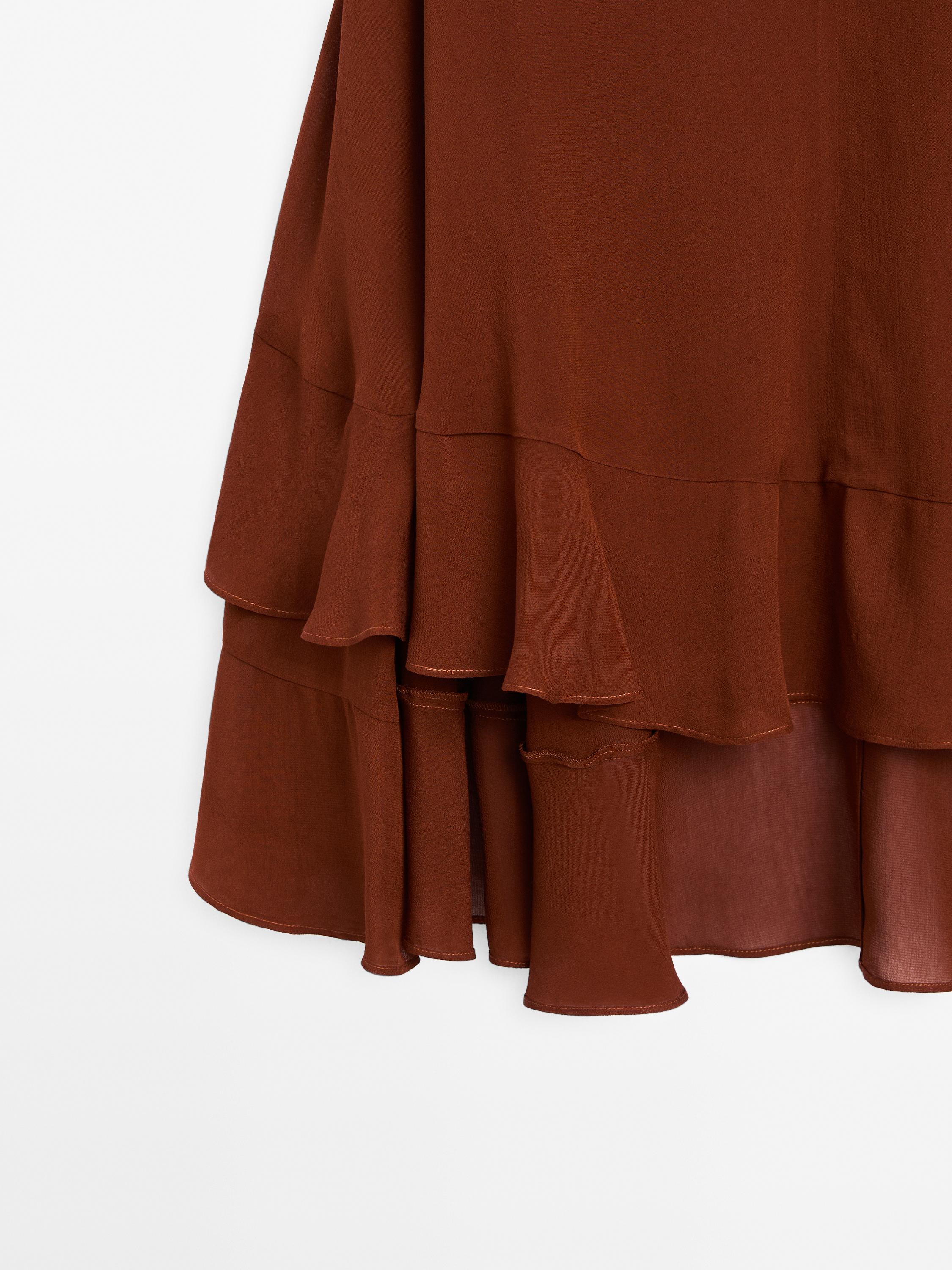 Blouse style cape à volants
