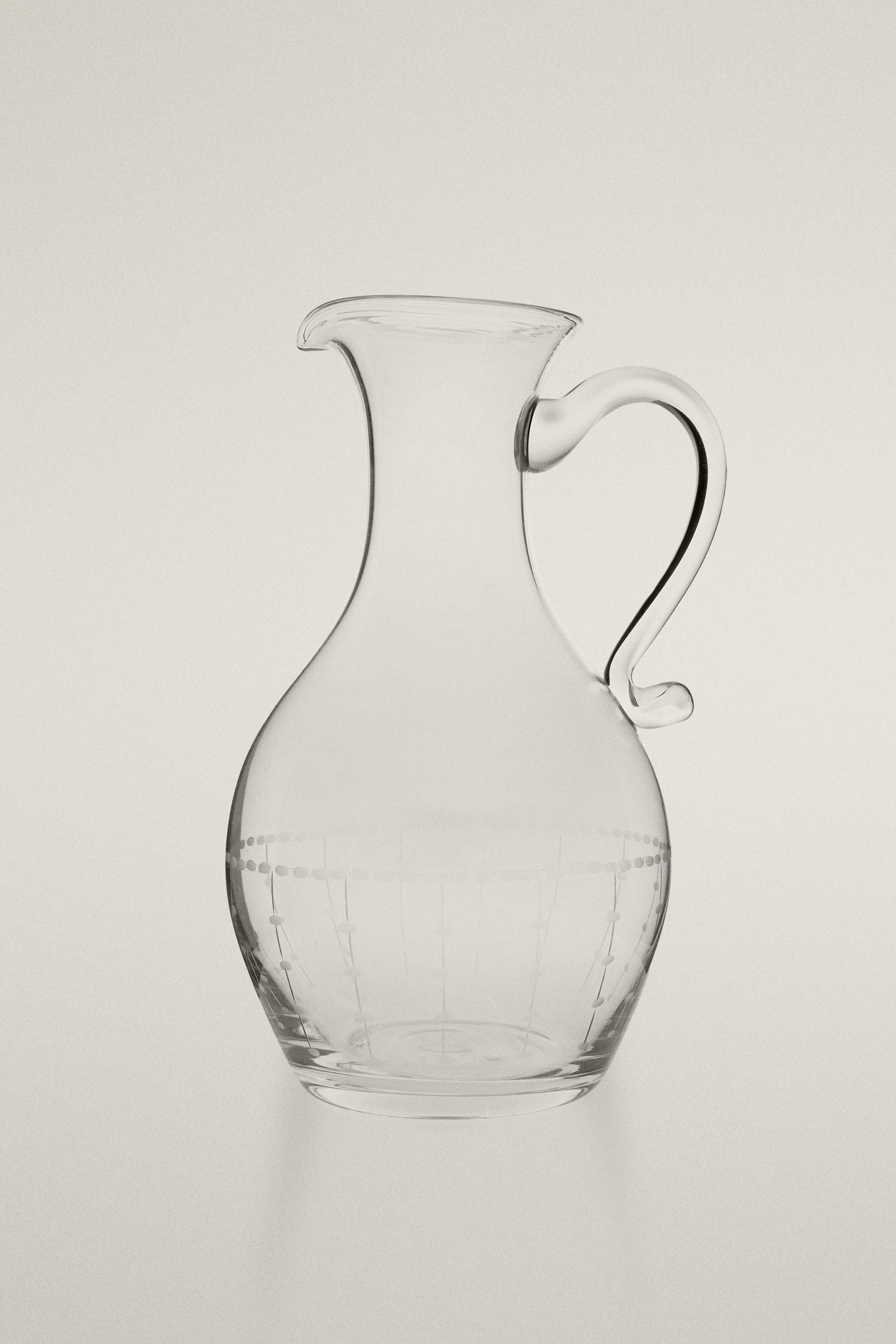 GEOMETRICALLY ENGRAVED GLASS PITCHER