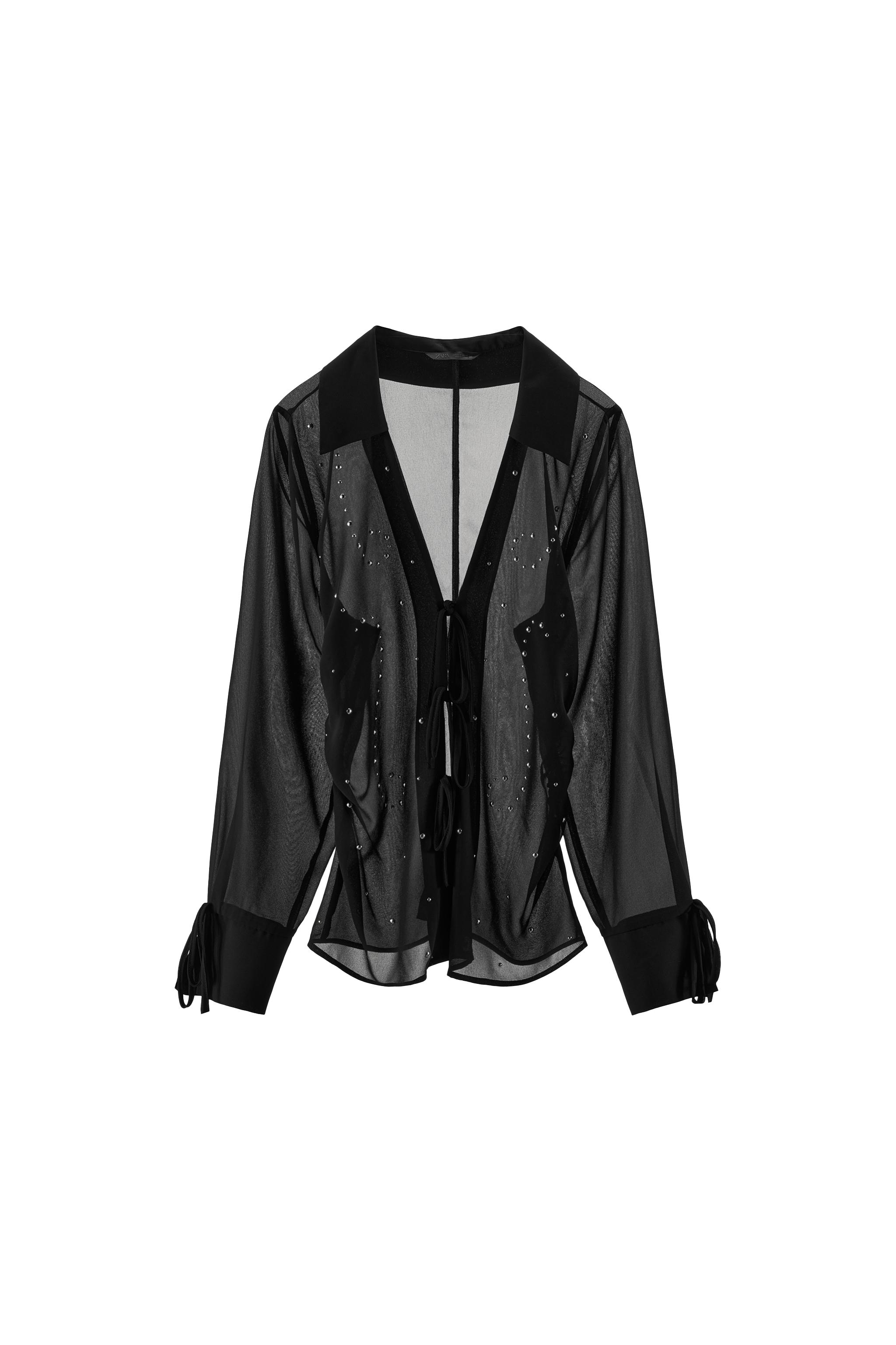 CAMISA SEMITRANSPARENTE TACHAS