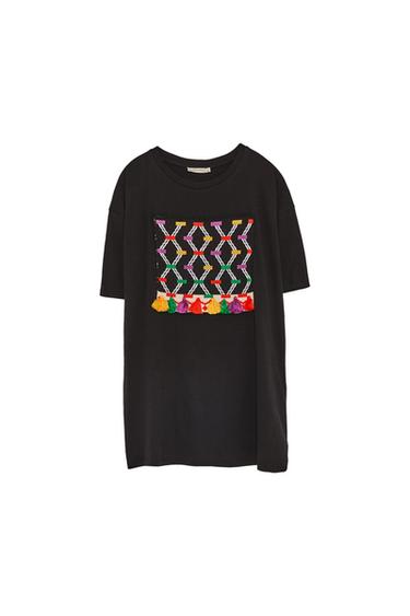 T-SHIRT WITH TRIBAL APPLIQUÉ