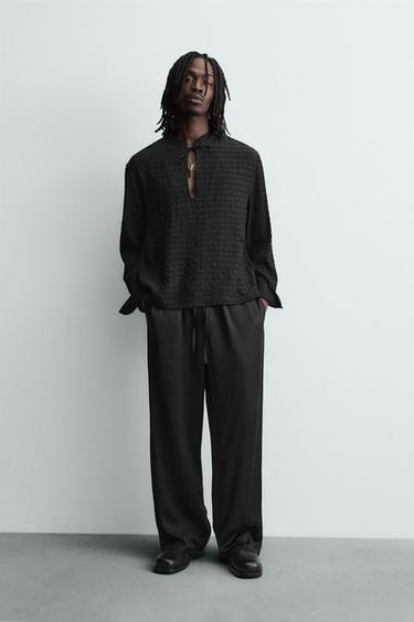 FLUID TEXTURED POLO SHIRT - Black by Zara