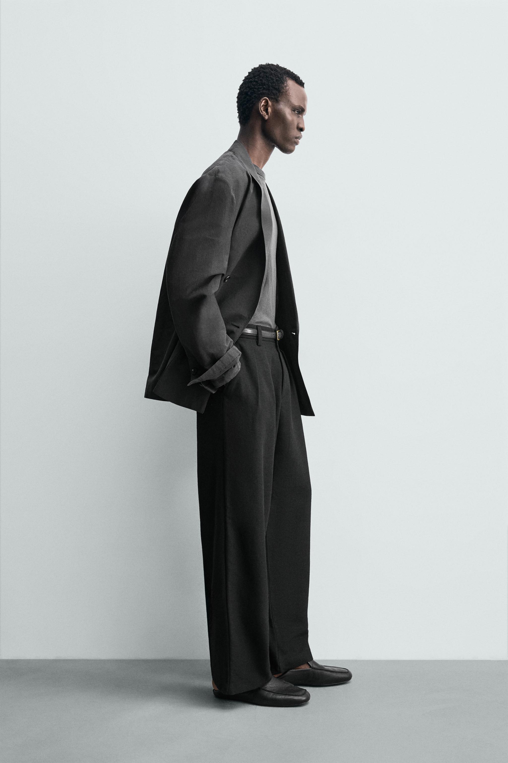 PLEATED RELAXED FIT PANTS