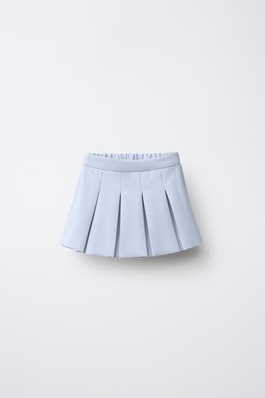 Falda short plisada