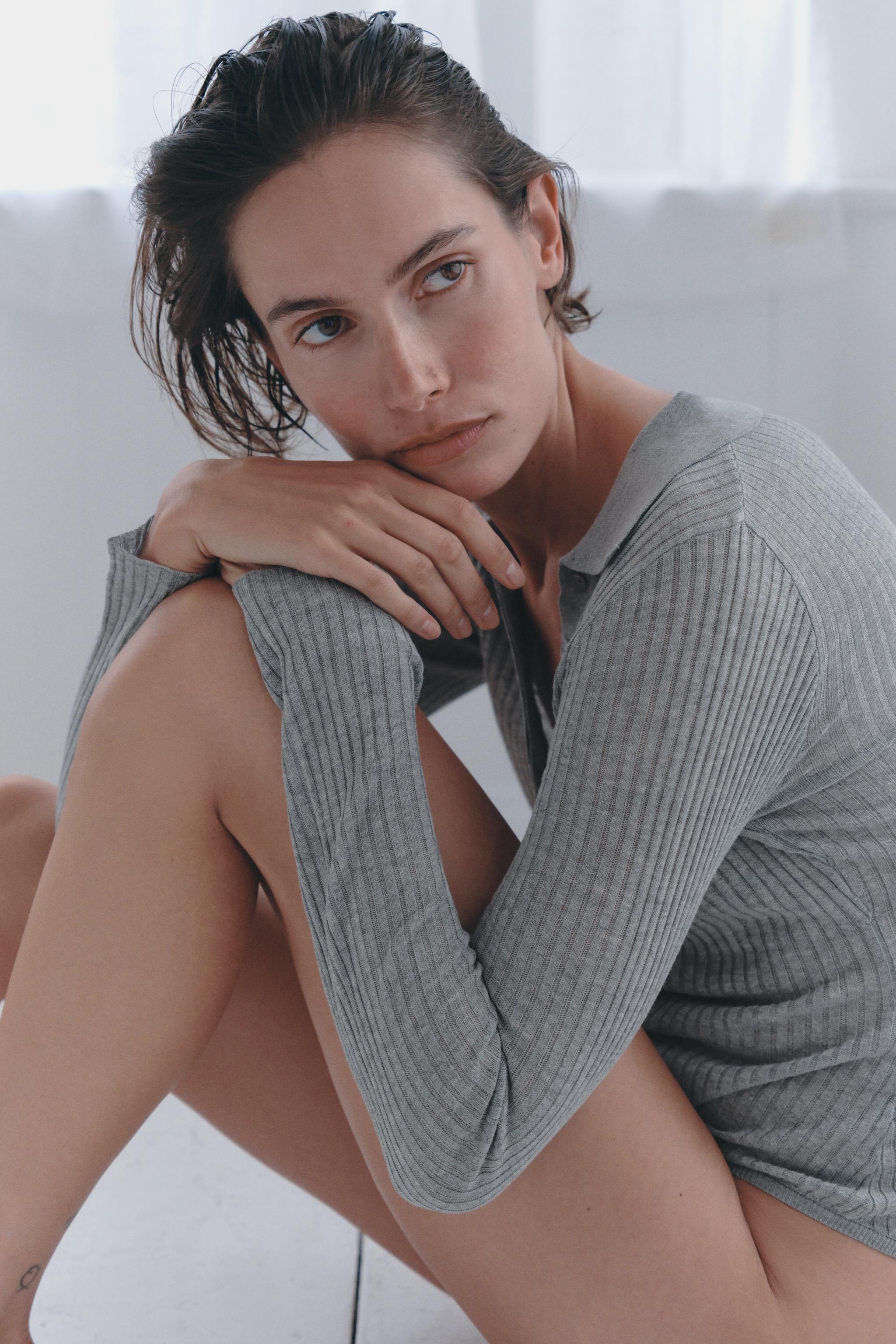 BUTTONED KNIT BODYSUIT