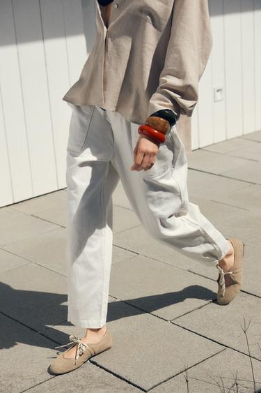 CALÇA JOGGER COM BOTÃO NA BARRA - Cru da Zara