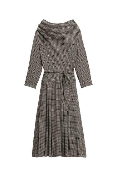 White midi plaid dress featuring a draped neckline, three-quarter sleeves, a tied belt, and a pleated skirt.