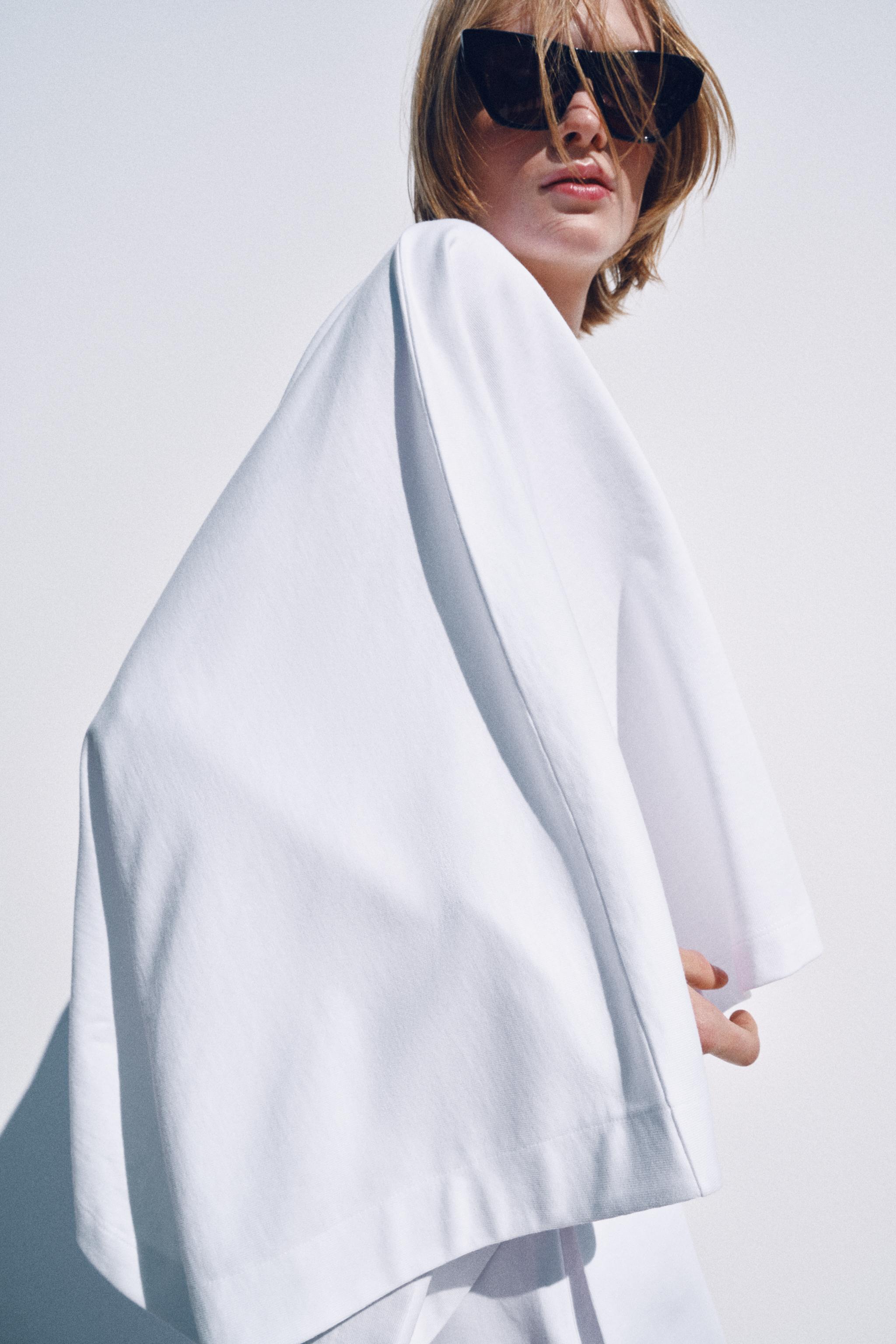 VOLUMINOUS HEAVY COTTON CAPE TOP