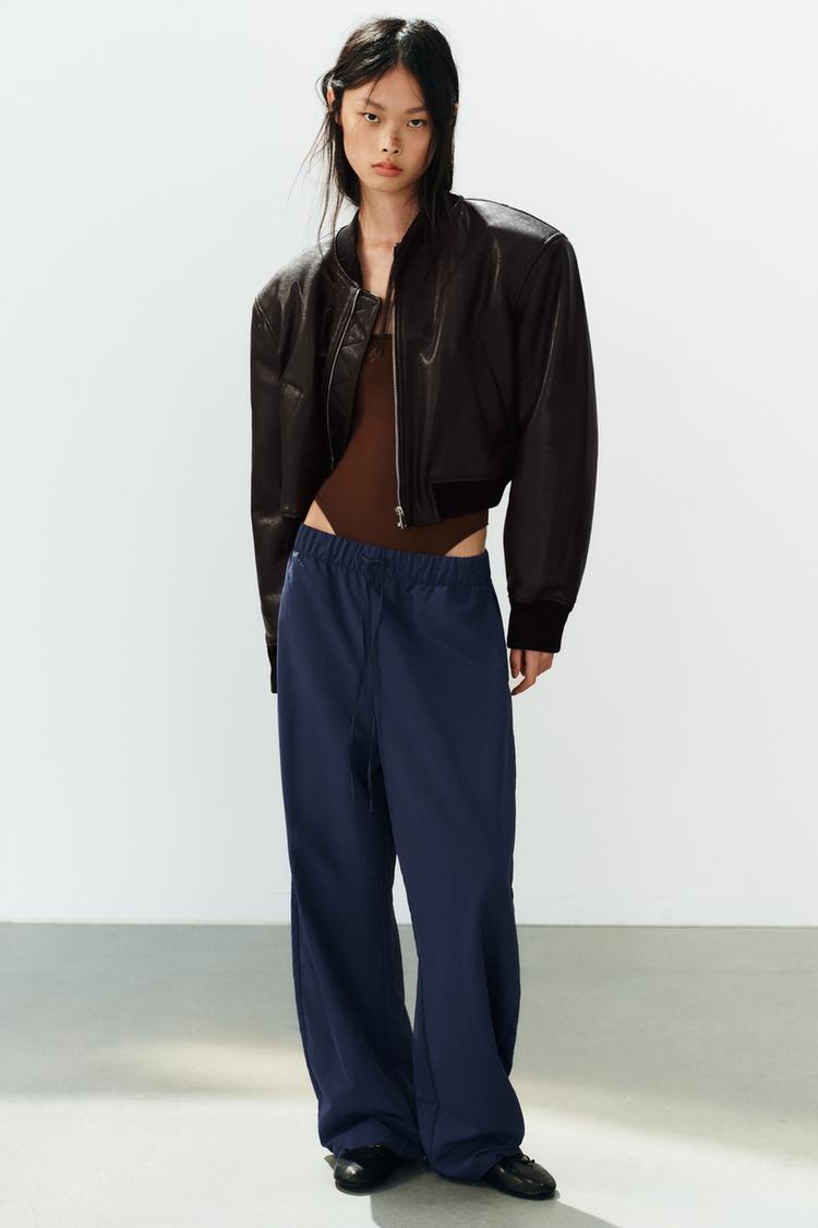LEATHER-EFFECT BOMBER JACKET