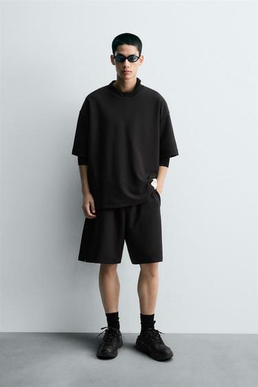 ÁO NỈ VẢI INTERLOCK ĐÍNH NHÃN - Màu đen từ Zara