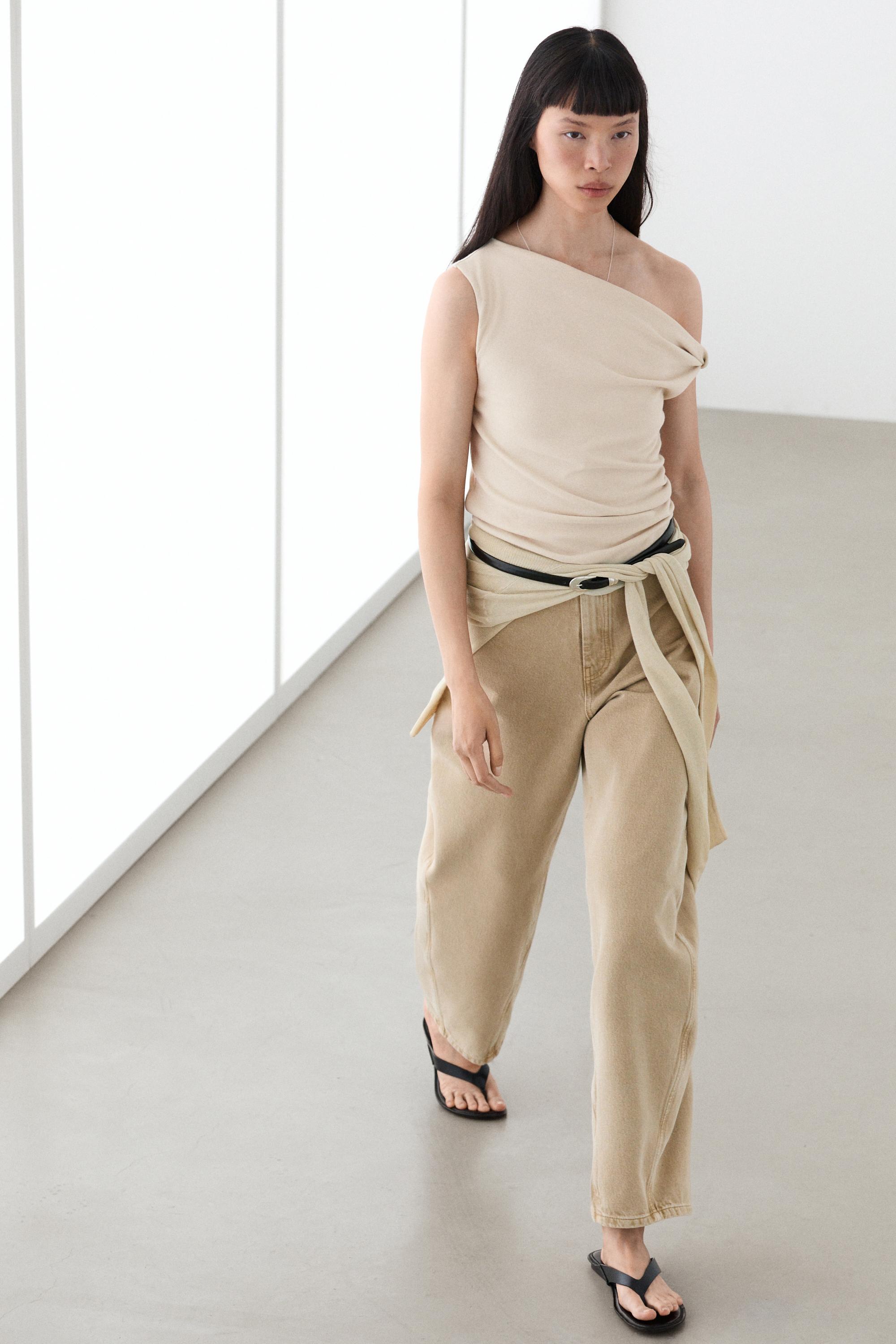 Asymmetric drop sleeve top