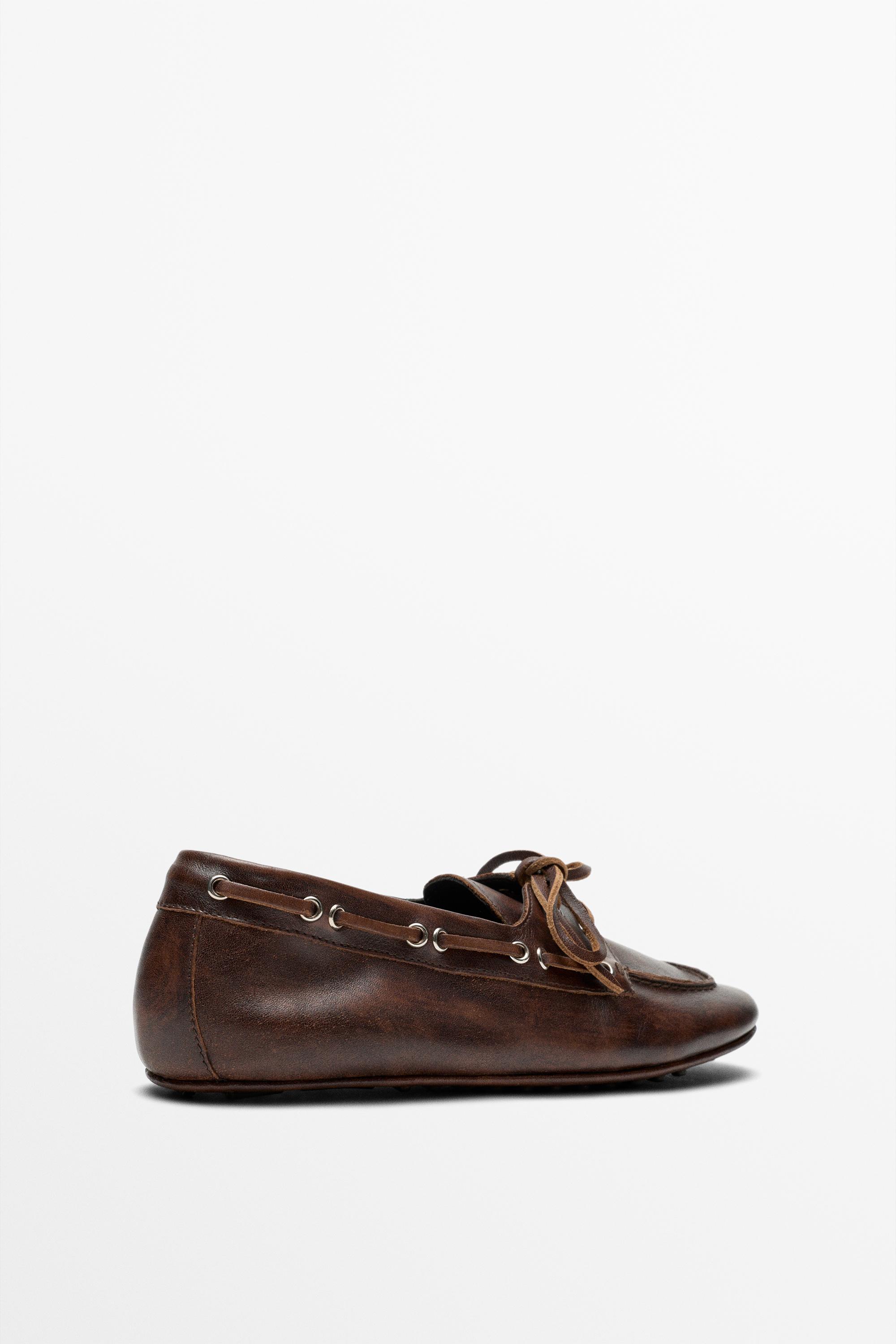 Leather lace-up boat shoe