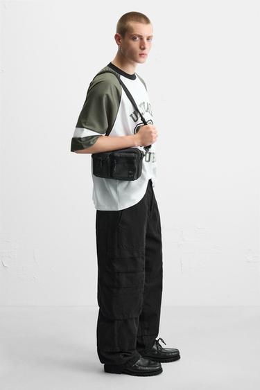 BANDOLERA TEJIDO BOLSILLOS - Negro de Zara - Imagen 0