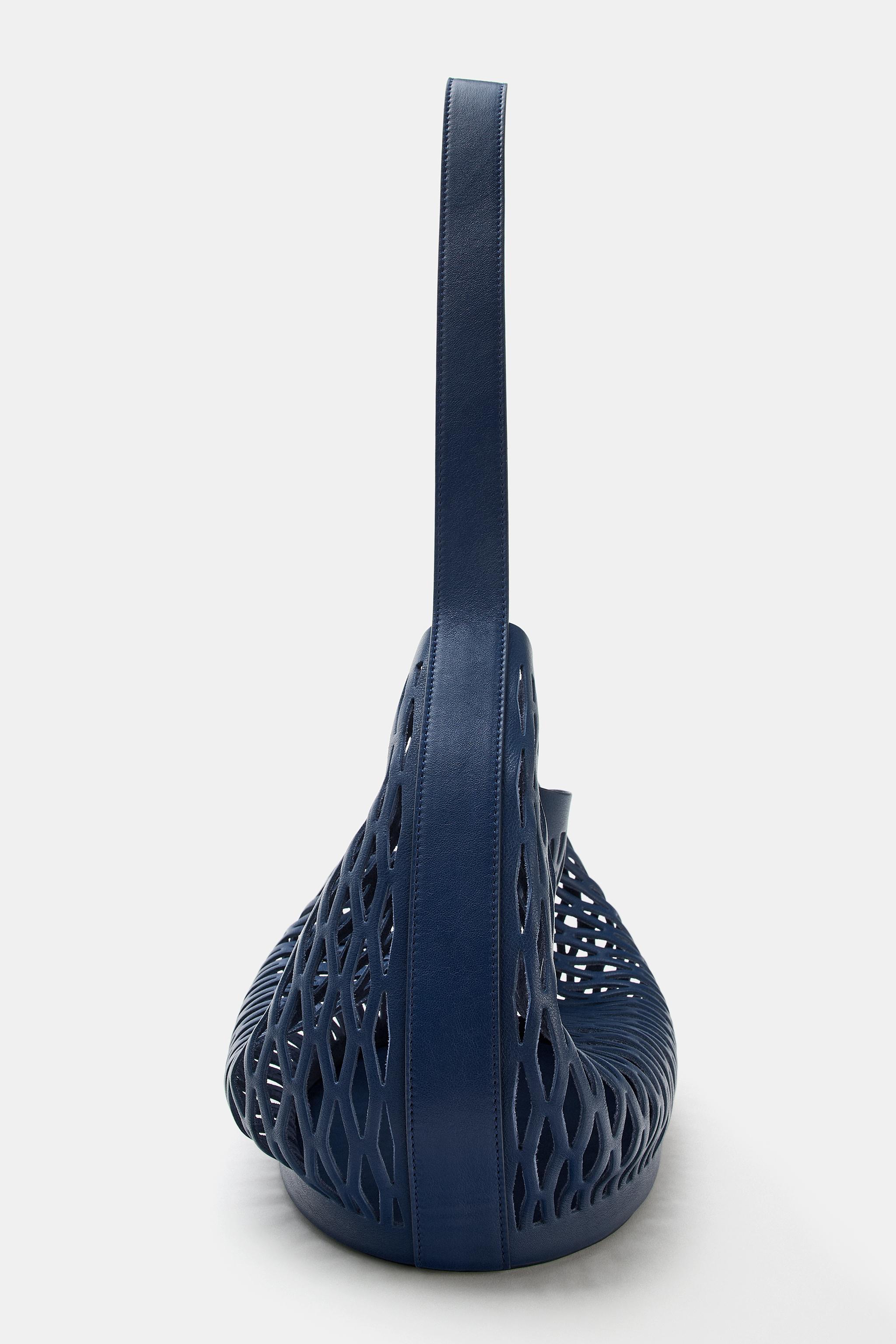 DIE-CUT LEATHER BAG