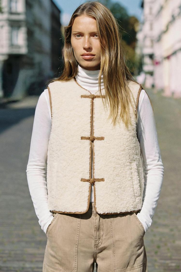 FAUX SHEARLING WAISTCOAT WITH FROG FASTENING