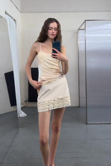 MINI SKIRT WITH RUFFLES AND STUDS - Ecru by Zara