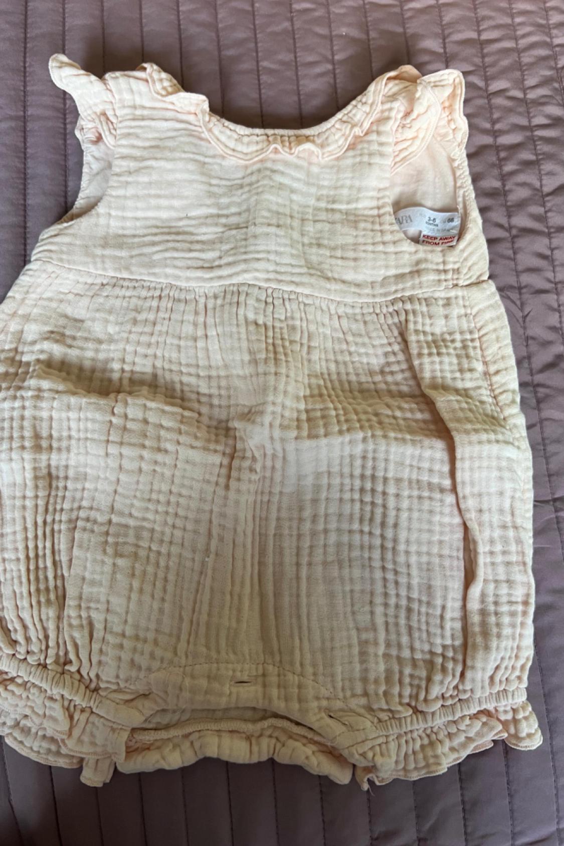 TEXTURED ROMPER WITH RUFFLE TRIMS