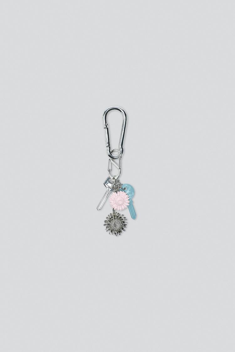FLOWER AND KEY CHARM KEYRING — Bluish