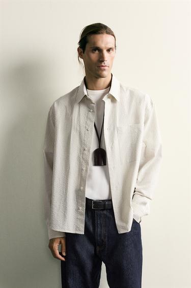 CAMISA RELAXED FIT ESTRUCTURA BOLSILLO - Crudo / Negro de Zara