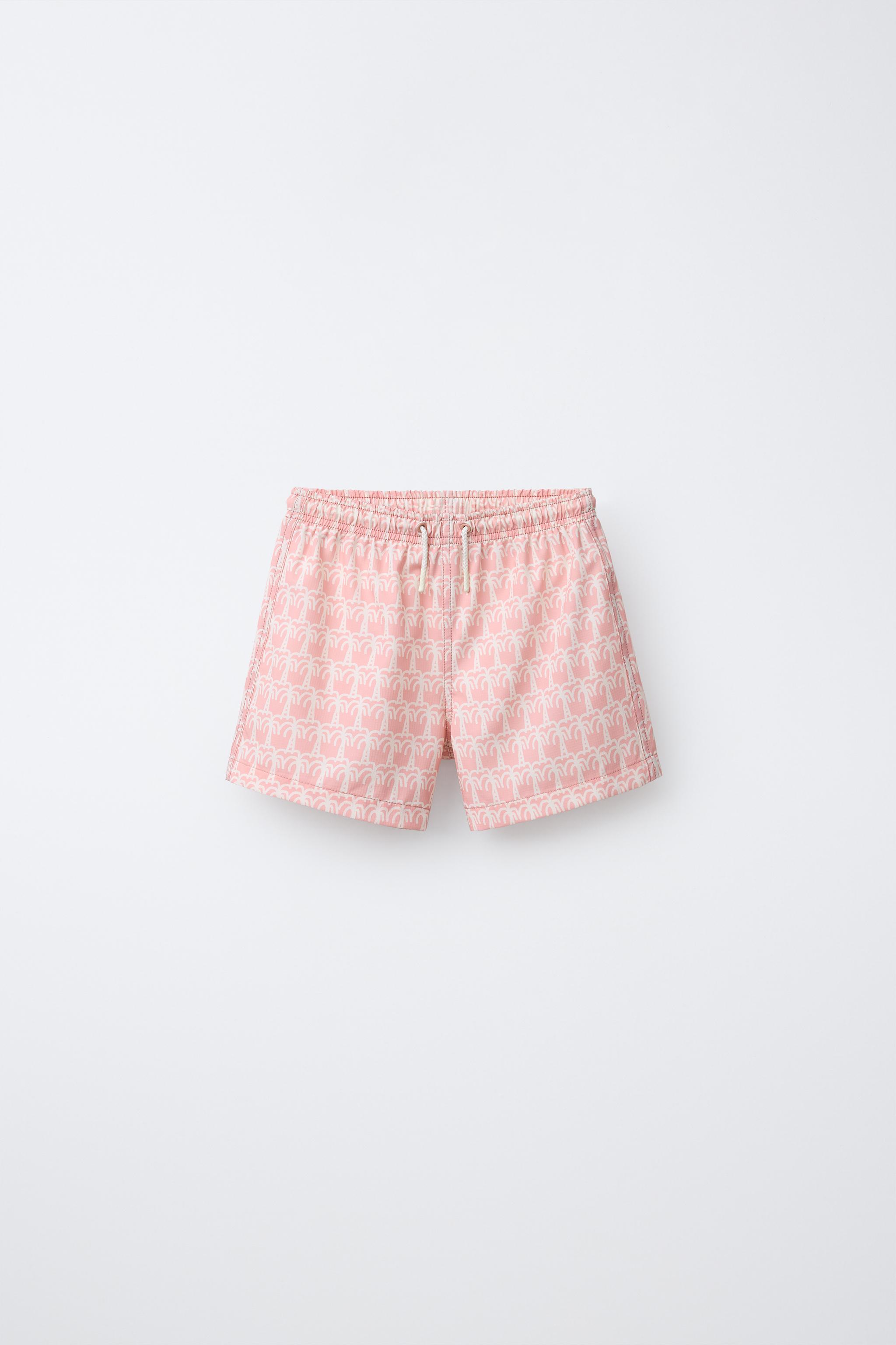 AGES 6-14 / PALM TREE SWIM SHORTS