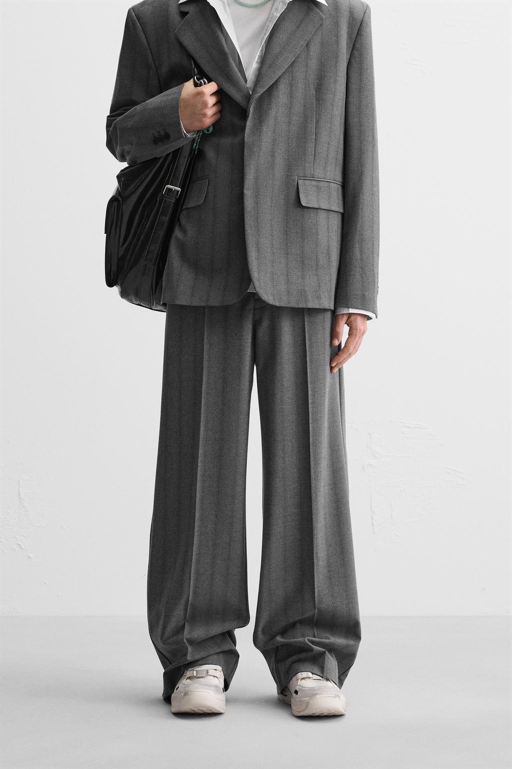 WIDE-FIT PLEATED TROUSERS