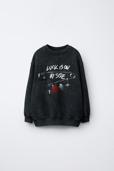 DESSUADORA AMB EFECTE RENTAT ESTAMPADA - Gris antracita de Zara - Imatge 0