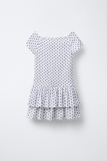 فستان بملمس وفريلز - خام / أسود الخاص بـ Zara