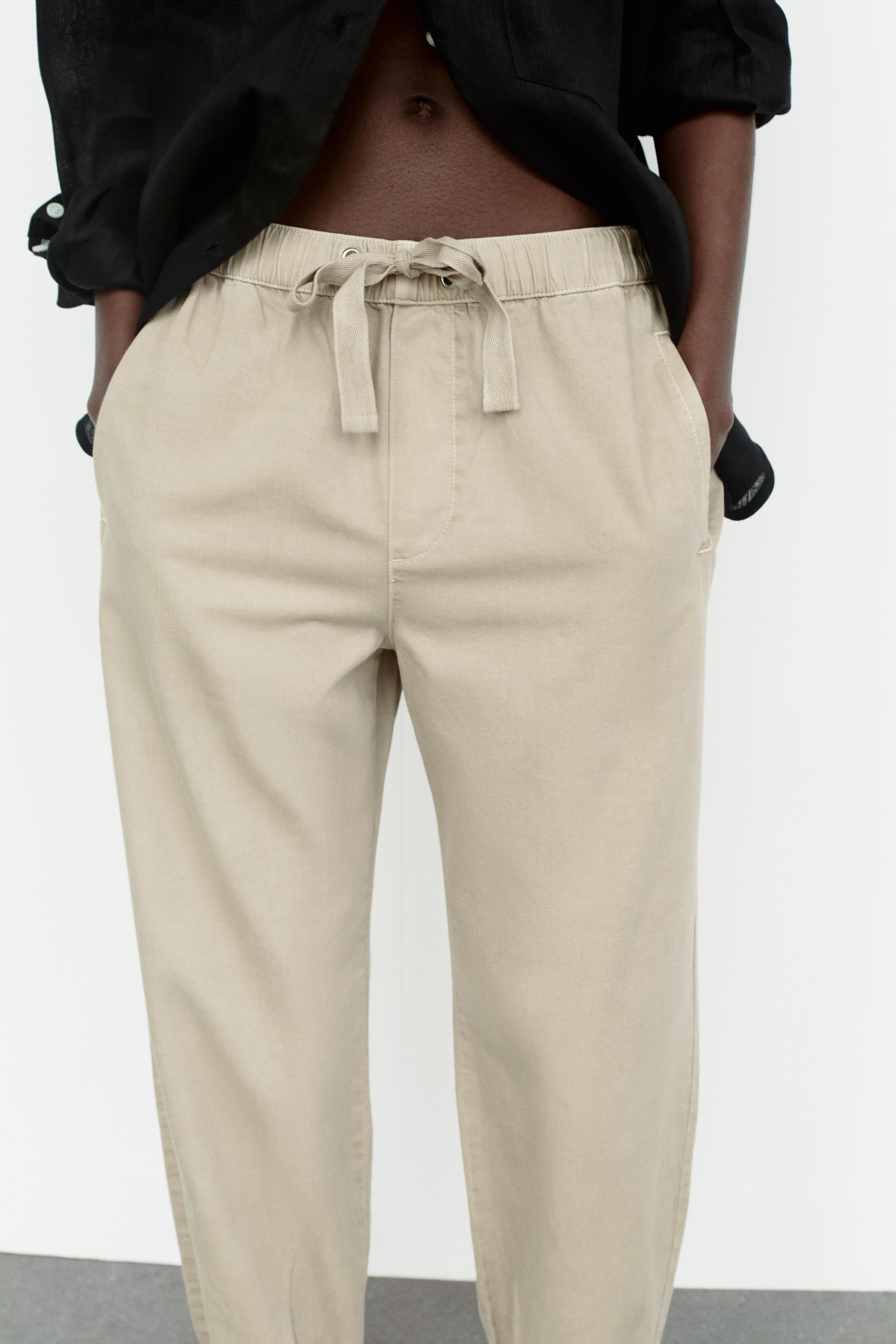 JOGGER TROUSERS WITH CUFFED HEMS