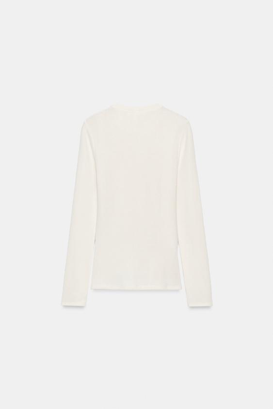 TOP SOFT À FINITIONS - Écru de Zara - Image 7