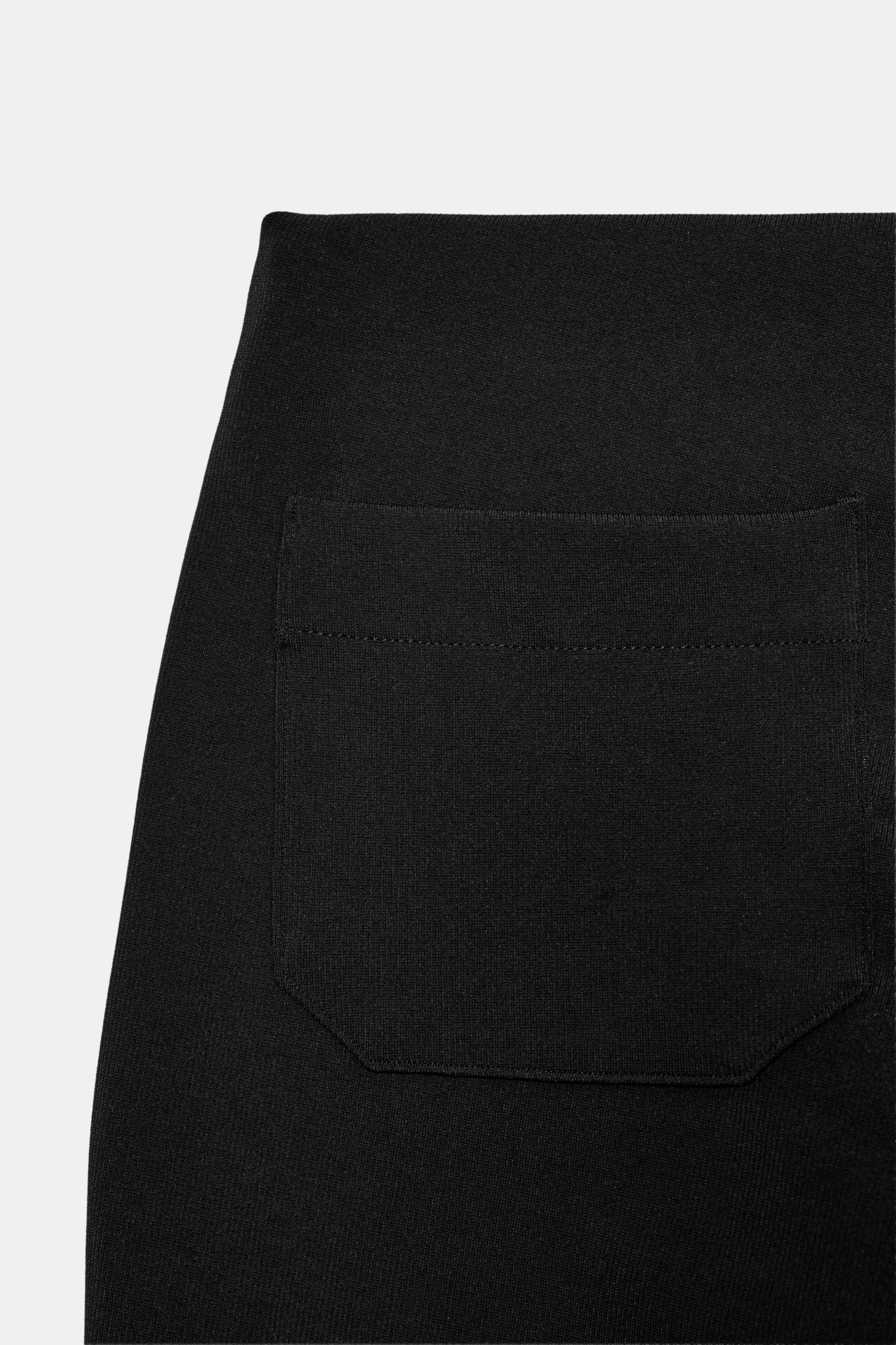 FITTED TROUSERS WITH POCKETS