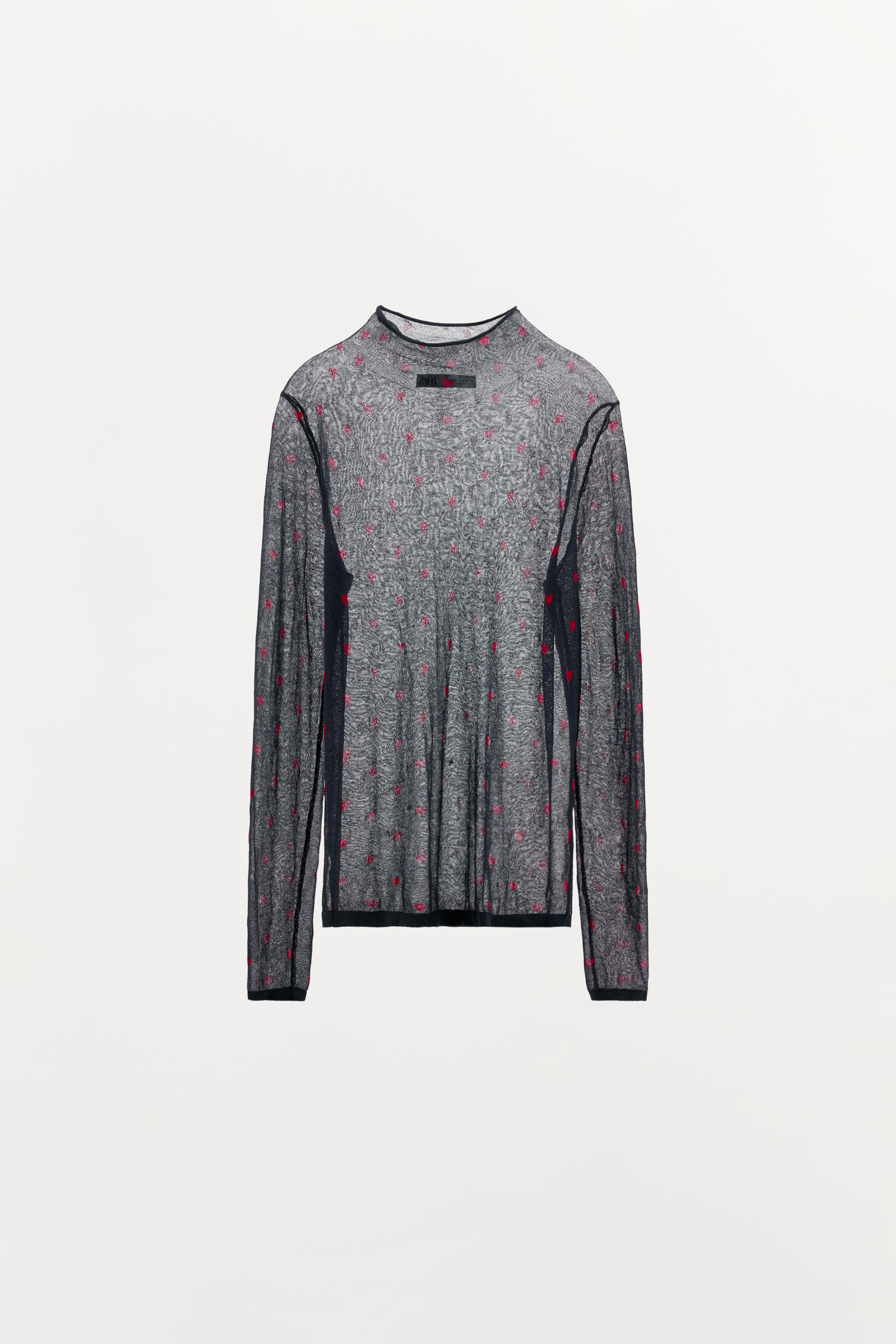 TOP EN MAILLE FINE À CŒURS