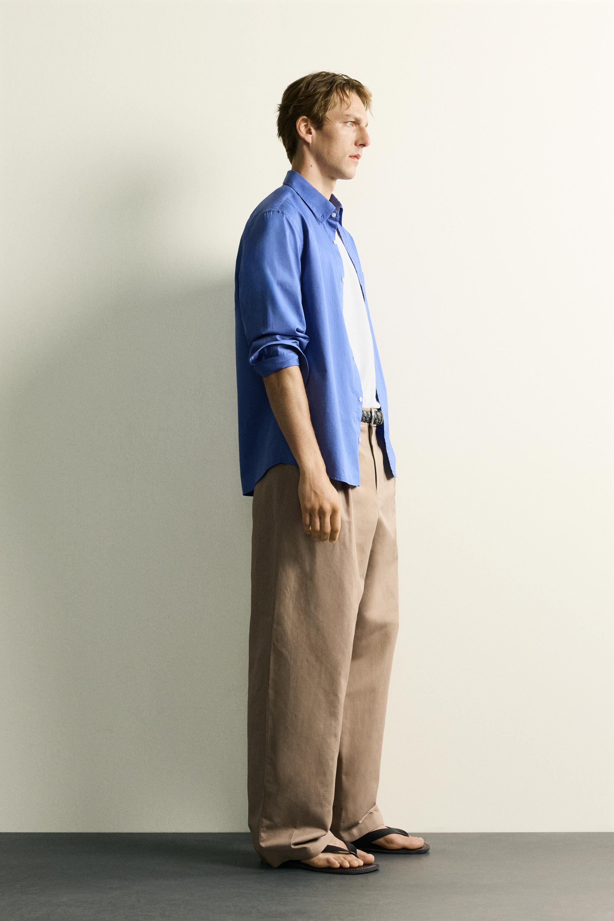 RELAXED FIT PLEATED PANTS