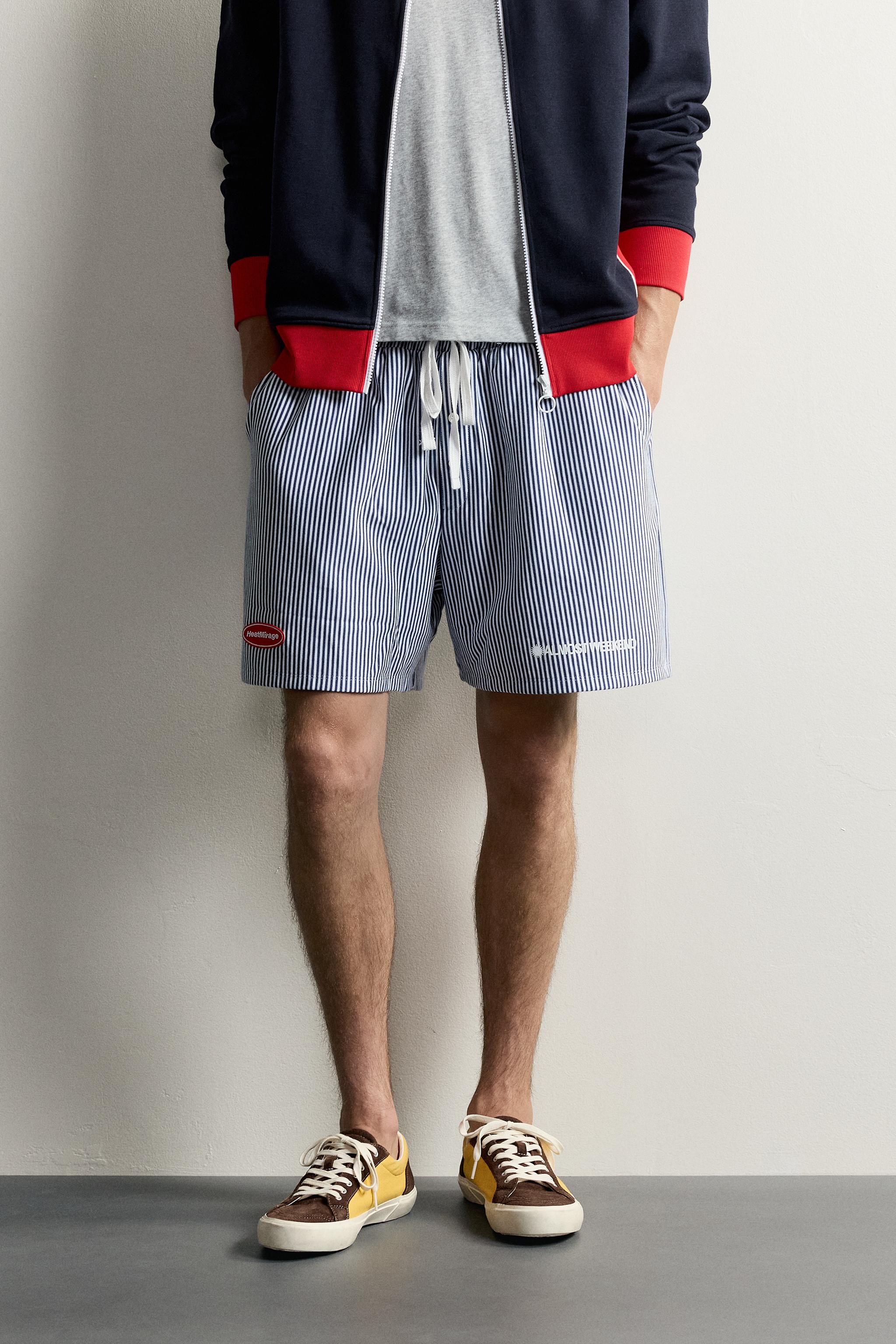 RELAXED FIT STRIPED PATCH BERMUDA SHORTS