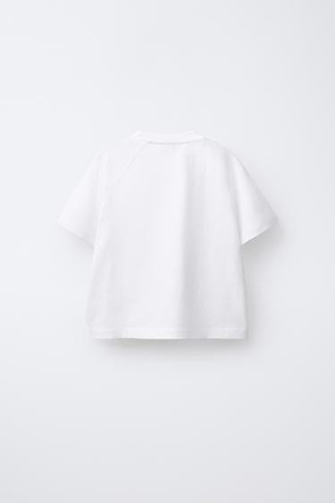 T-SHIRT À MANCHES RAGLAN IMPRIMÉ - Blanc de Zara - Image 1