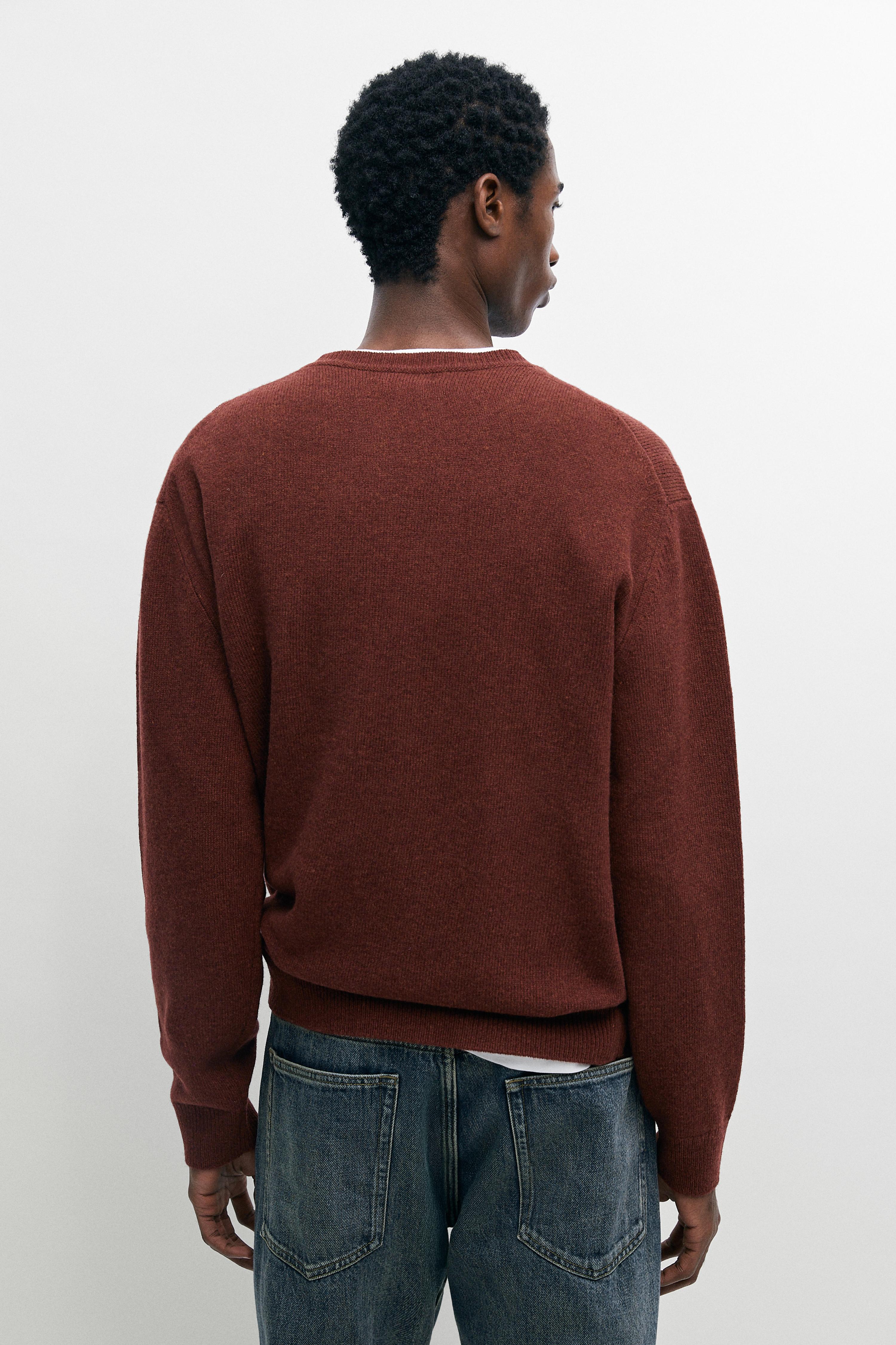 100% wool melange knit sweater
