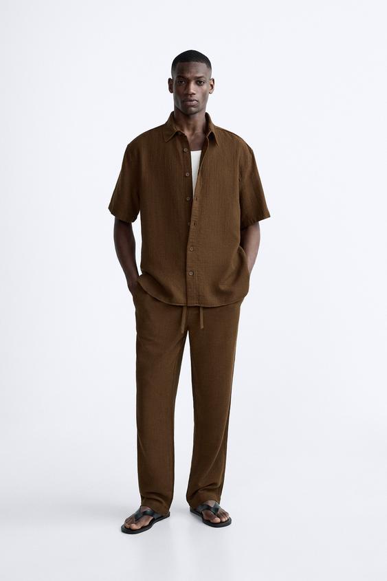 CREASED-EFFECT TROUSERS - Brown | ZARA United Kingdom