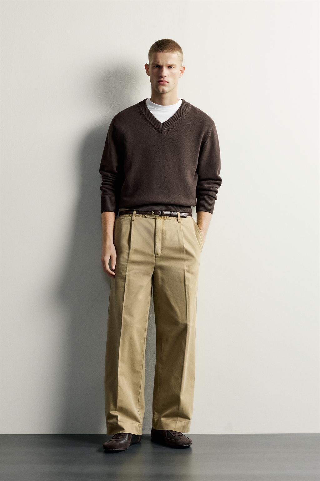 PLEATED RELAXED FIT CHINO TROUSERS