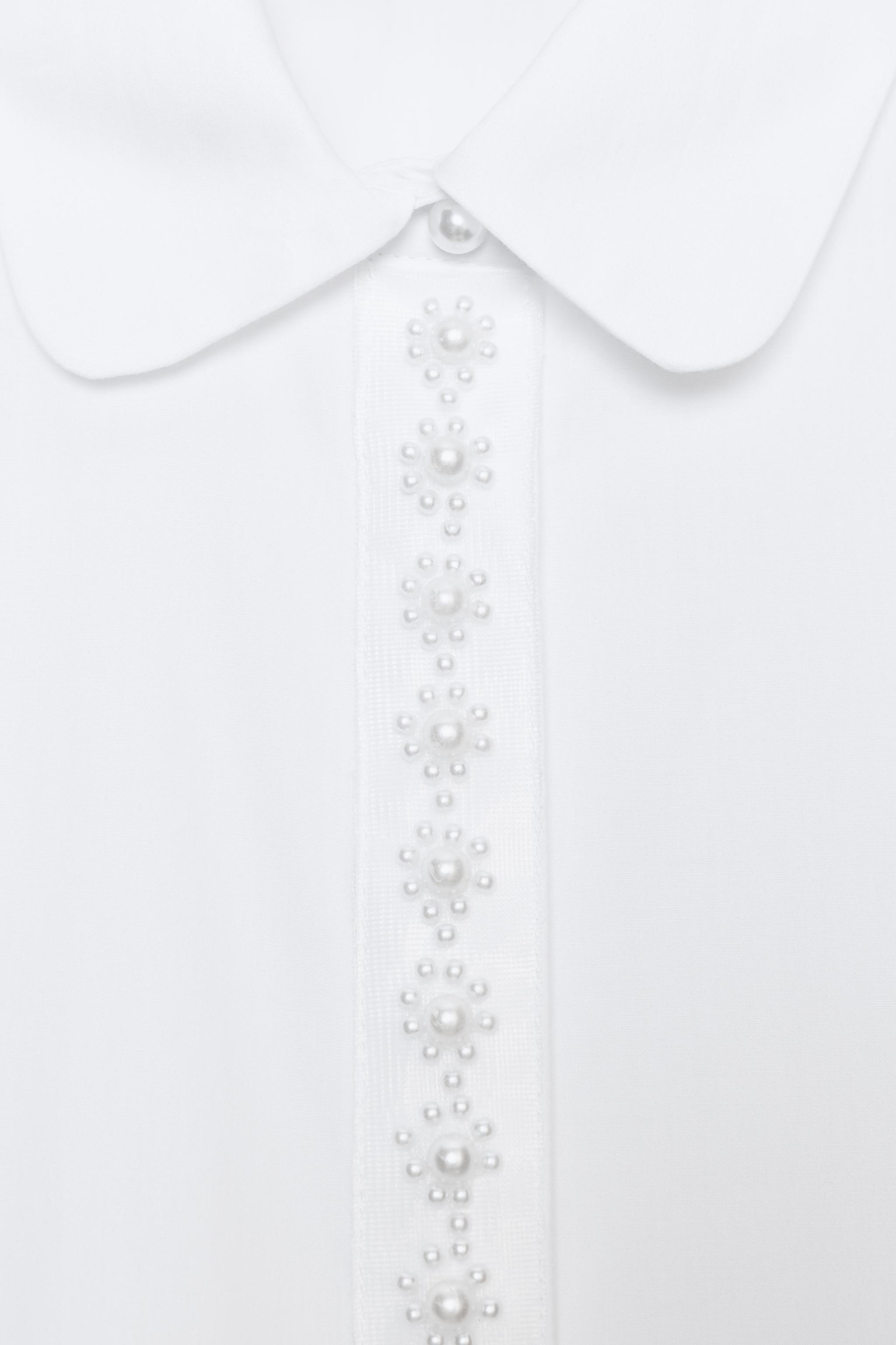 CHEMISE EN POPELINE À PERLES