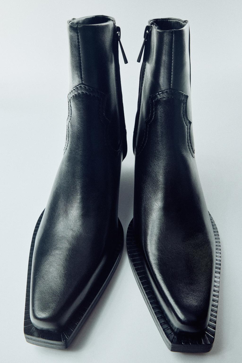 COWBOY-HEEL LEATHER ANKLE BOOTS