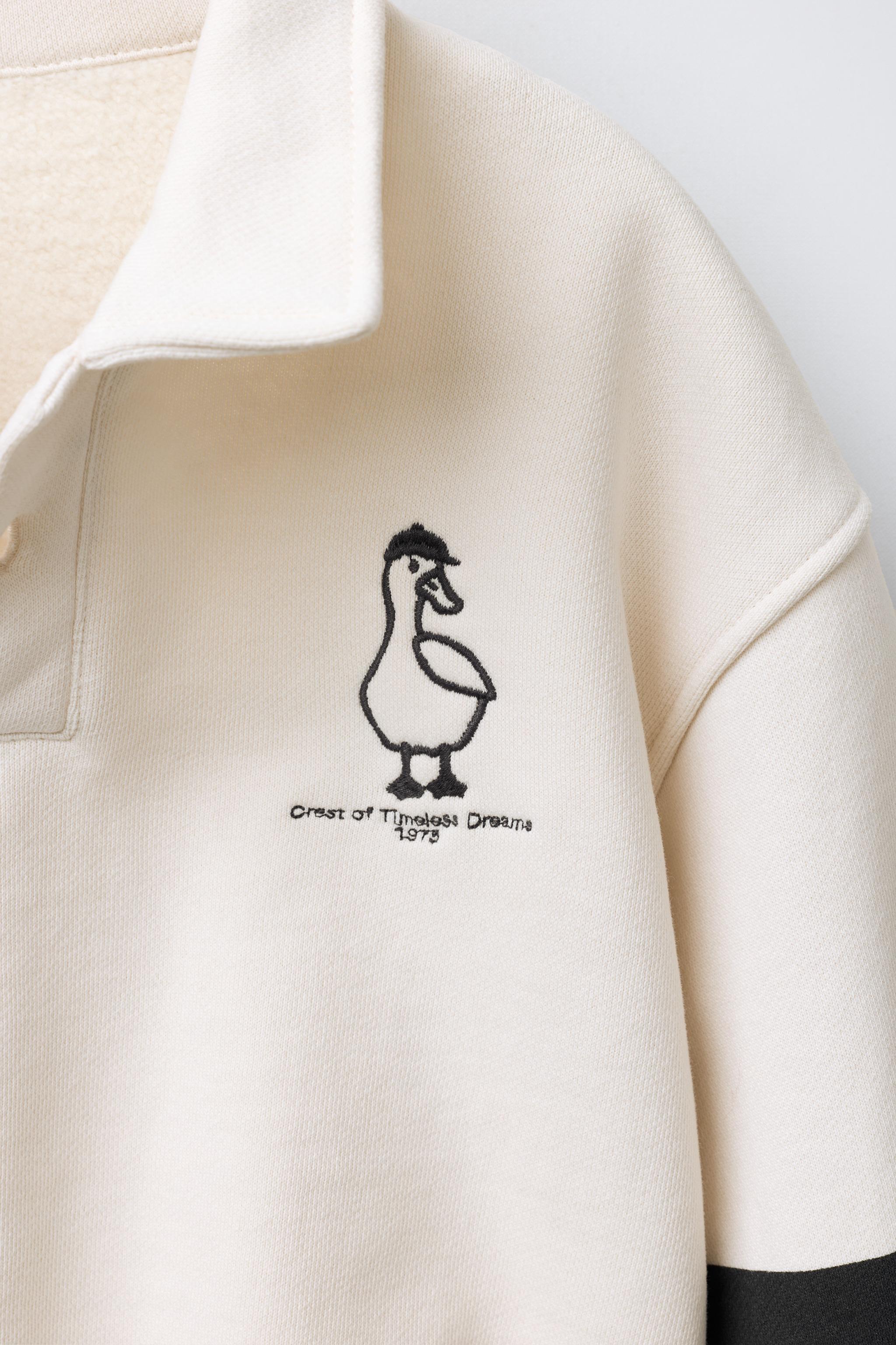 EMBROIDERED DUCK POLO SWEATSHIRT