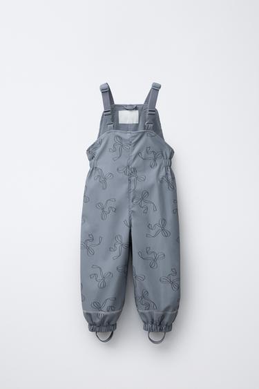 Zara RUBBERIZED WATER-RESISTANT PRINTED OVERALLS - Mid-blue